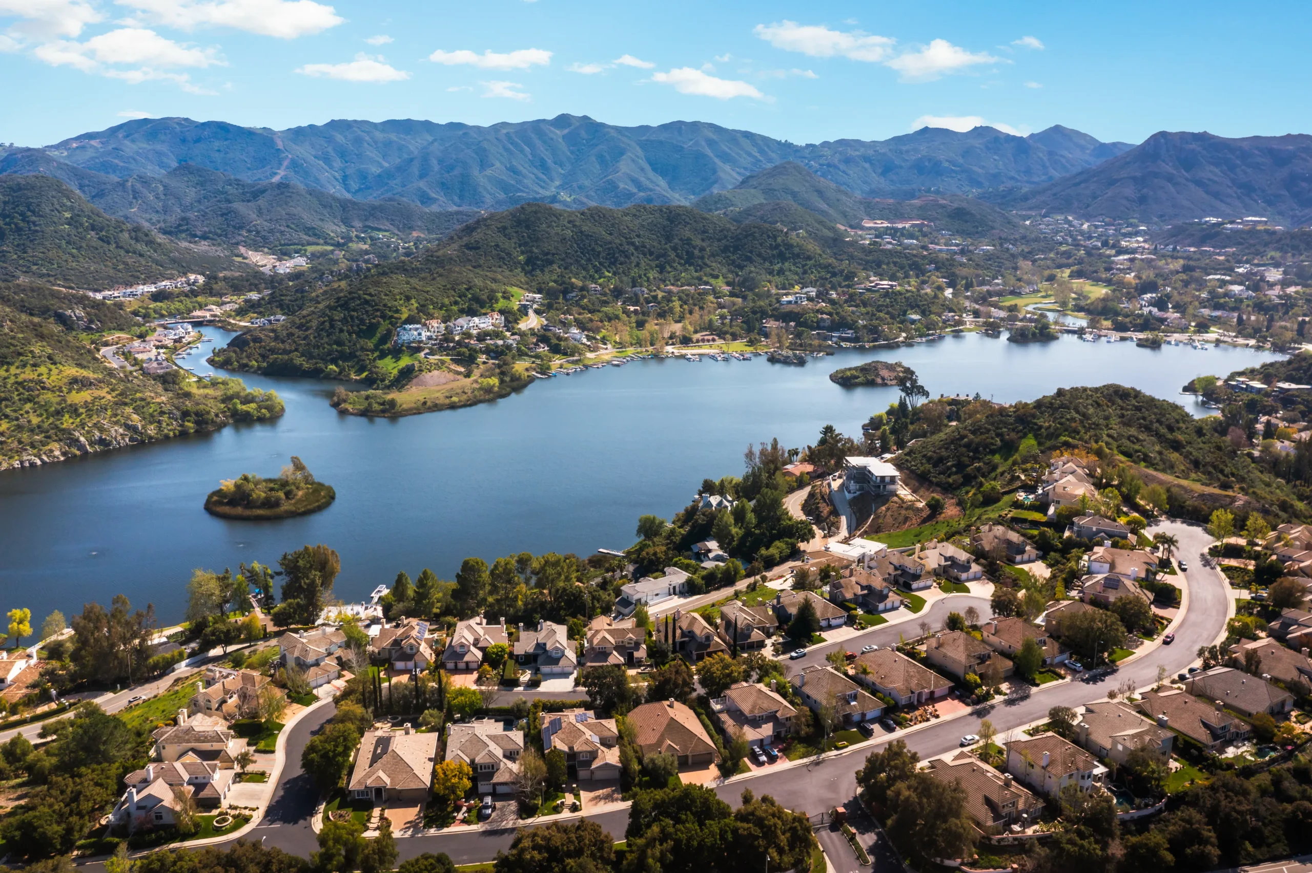 Aerial view of lake and neighborhood