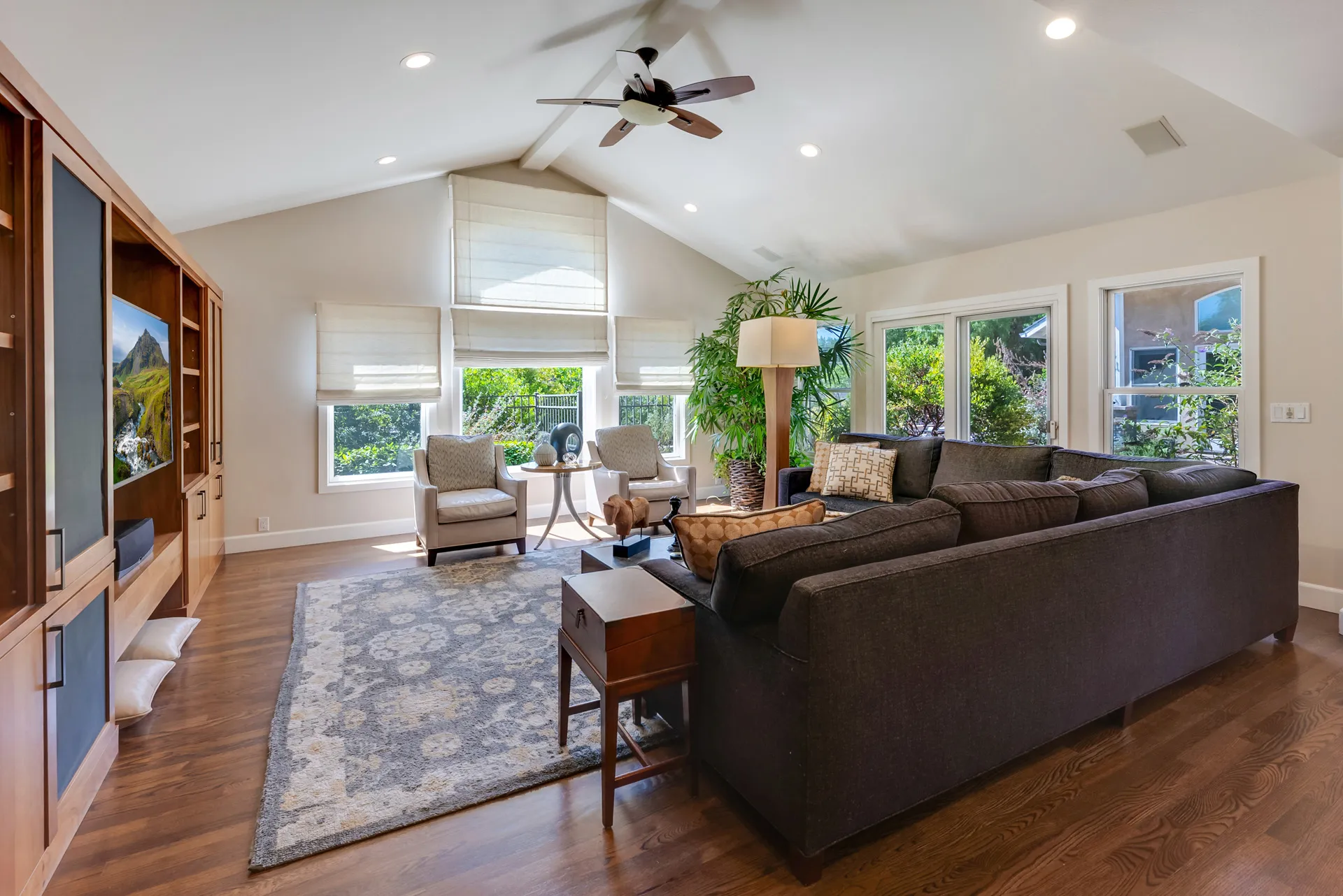 Family room toward windows cabinets visible