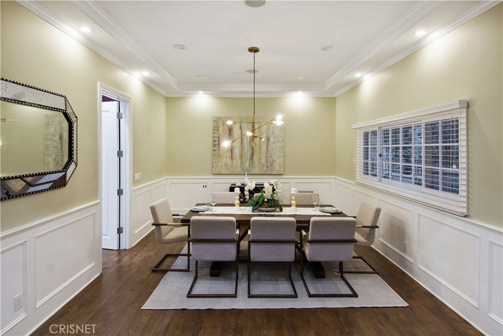 Dining room with large table and chairs,